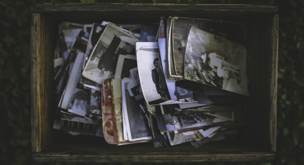 Are old photos accurate reflections of memory, or do they distort?